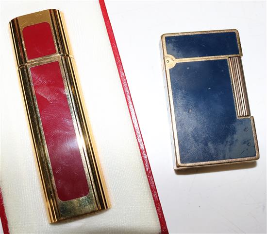 Dupont blue enamel and gilt metal pocket lighter and a Cartier perfume spray
